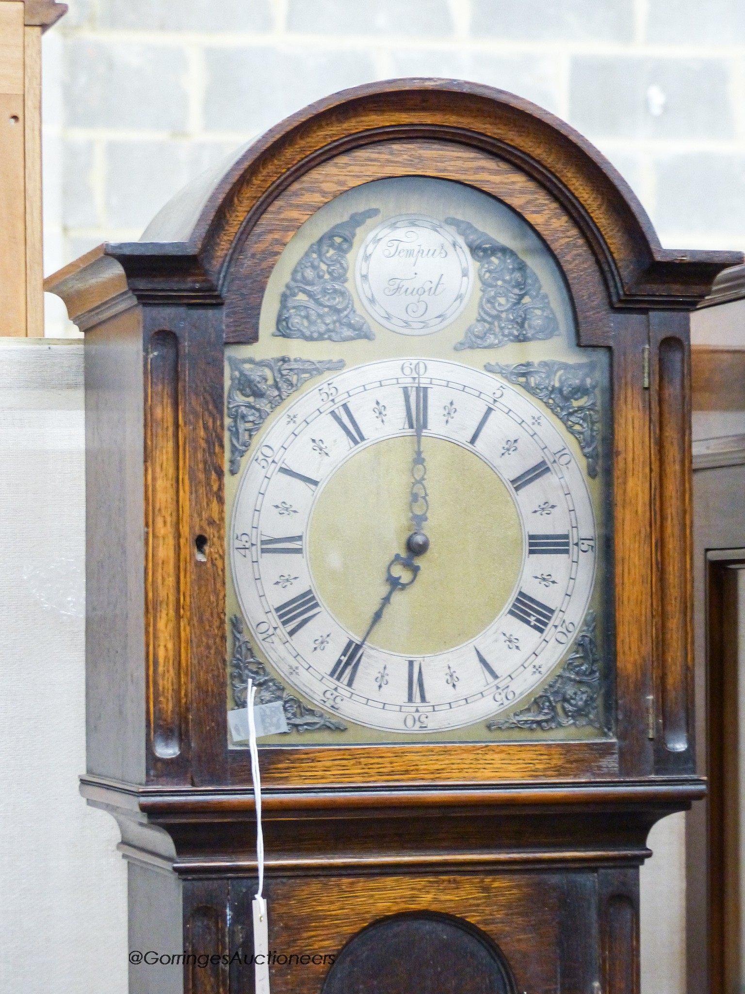 A 1920's oak longcase clock, height 193cm